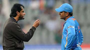 Former chairman of selectors Sandeep Patil, in conversation with former India captain MS Dhoni.