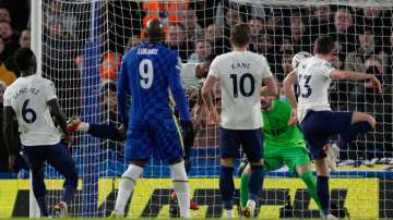 Tottenham's Ben Davies (far right) scores an own goal past his goalkeeper Hugo Lloris (in green) dur