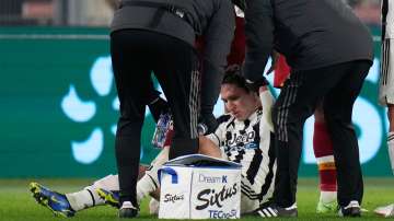 The medical staff helps the injured Juventus' Federico Chiesa during the Italian Serie A match again