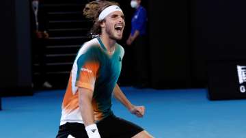 Stefanos Tsitsipas celebrates after defeating Benoit Paire in the third round of the Australian Open