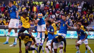 Ecuador's Felix Torres (second from left) heads the ball to score his side's first goal against Braz