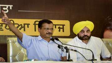 Delhi Chief Minister Arvind Kejriwal with Punjab AAP President Bhagwant Mann, addresses a press conference in Ludhiana.