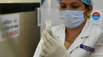 A medic prepares the dose of Covaxin vaccine for a beneficiary during a countrywide inoculation drive against COVID-19.