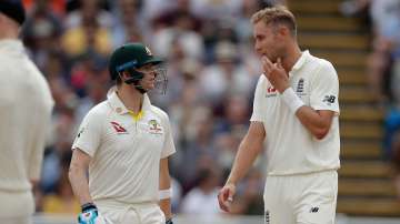 Steve Smith of Australia speaks with Stuart Broad of England during the 1st Specsavers Ashes Test.