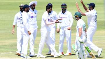 India celebrate the wicket of Dean Elgar of South Africa during the 1st Betway WTC Test match.