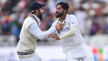 File Photo of ex India Test captain Virat Kohli and pacer Mohammed Siraj.