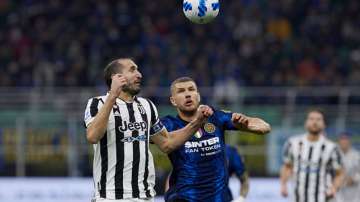 Juventus' Giorgio Chiellini (left) and Inter Milan's Edin Dzeko tested COVID-19 positive recently.