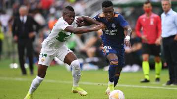 File photo of Elche's Helibelton Palacios (in white) with Real Madrid's Vinicius Junior.