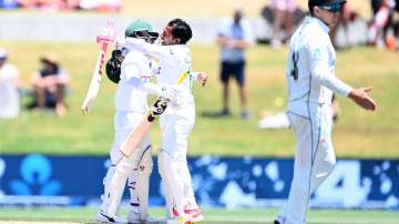 Mominul Haque and Mushfiqur Rahim of Bangladesh celebrate after winning the first test match 