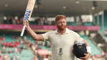 England's Jonny Bairstow celebrates scoring a century as he leaves the ground during day three of th