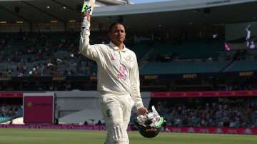 Usman Khawaja of Australia leaves the field at the declaration during day four of the Fourth Test 