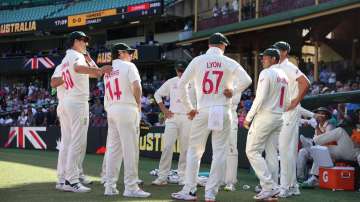 Australian players discussing with each other on Day 4 of the fourth Test against England in Sydney