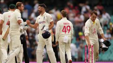 Stuart Broad shakes hands with Jimmy Anderson of England after the SCG Test against Australia ended 