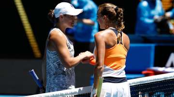 Ashleigh Barty of Australia shakes hands with Lucia Bronzetti of Italy after winning her 2nd round.