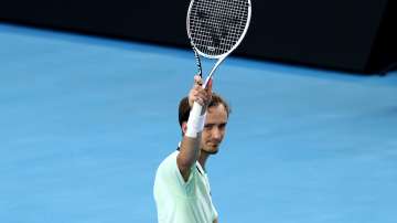 Daniil Medvedev of Russia celebrates after winning match point against Maxime Cressy 