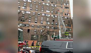 ?
Nine children among 19 dead in massive fire at New York building
?