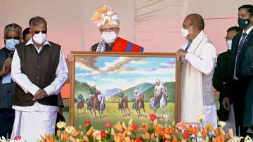 Prime Minister Narendra Modi receives a memento during inauguration and foundation stone laying of development projects in Manipur, in New Delhi, Tuesday, Jan. 4, 2021.
