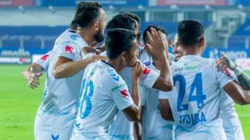 Odisha FC players celebrate their goal against NorthEast United FC during an ISL match in Margao on 