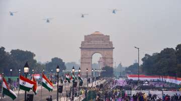 Indian Air Force choppers fly in a formation during the full dress rehearsal of the Republic Day Parade 2022, at Rajpath.