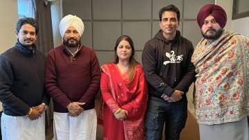 Punjab Chief Minister Charanjit Singh Channi and PPCC President Navjot Singh Siddhu with Bollywood actor Sonu Sood and his sister Malvika Sood Sachar, after Malvika joins Congress ahead of Punjab Assembly elections. 