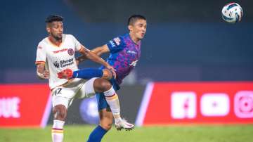 East Bengal right-back Joyner Lourenco and Bengaluru FC striker Sunil Chhetri vie for the ball in Ba