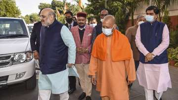 Union Home Minister Amit Shah and UP CM Yogi Adityanath at the BJP office in New Delhi.