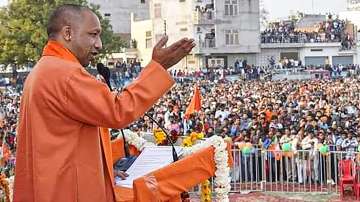 Uttar Pradesh Chief Minister Yogi Adityanath addresses an election campaign, for UP Assembly elections, in Etawah, Tuesday, Feb. 15, 2022.