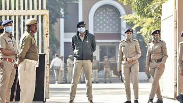 Security personnel outside the special court in Ahmedabad on February 8, 2022.