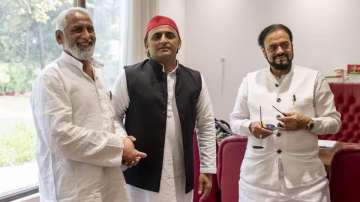 Akhilesh Yadav with Abu Azam and SP leader Shadab Ahmed, whose son Mohammad Saif is a convict in 2008 Ahmedabad blast case.