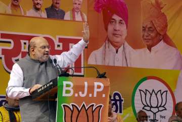 Union Home Minister Amit Shah addresses a public meeting ahead of the Uttar Pradesh Assembly elections, in Atrauli.