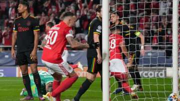 Ajax's Sebastian Haller (far left) reacts after scoring an own goal during the Champions League roun