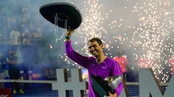 Spain's Rafael Nadal celebrates after defeating Britain's Cameron Norrie in the final match at the M