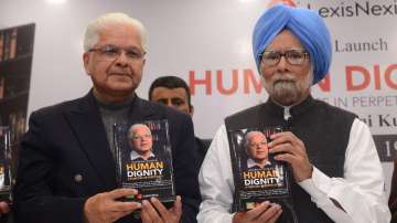 Ashwani Kumar with former PM Manmohan Singh at a book launch event in Delhi.?(FILE)