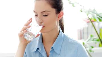 How much water should a woman drink a day?
