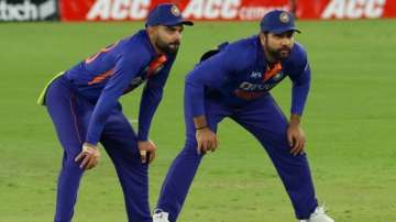 Virat Kohli and Rohit Sharma fielding in the 3rd ODI against West Indies at Ahmedabad.