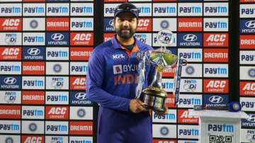 India skipper Rohit Sharma posing at the camera with the trophy after winning the series 3-0 