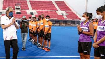 File photo of Odisha CM Naveen Patnaik with Indian men's and women's hockey teams.