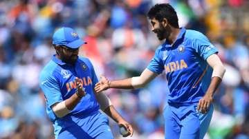 File photo of Indian skipper Rohit Sharma with pacer Jasprit Bumrah.