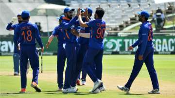 Indian players celebrate after taking a wicket in an ODI match  