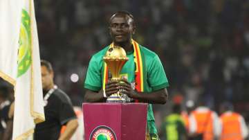 Senegal's Sadio Mane poses with the trophy after his team's victory in the 2021 Africa Cup of Nation