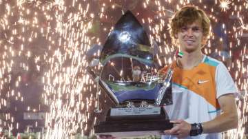 Russia's Andrey Rublev holds the trophy after defeating Czech Republic's Jiri Vesely in the Men's fi