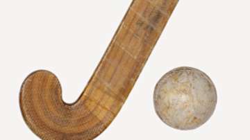 Hockey stick and ball (Representational photo)