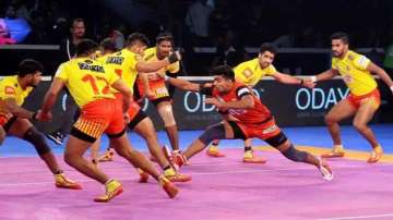 Pawan Sherawat of Bengaluru Bulls during a raid against Gujarat Giants in PKL 2021-22