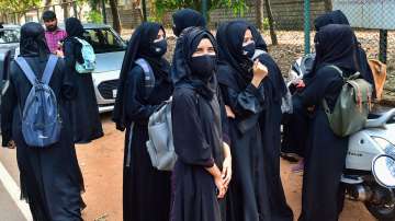 Students leave after they were not allowed to attend classes while wearing Hijab, at Dr G Shankar Government Womens First Grade College in Udupi, Thursday, Feb. 17, 2022.