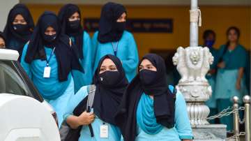 Students leave after they were not allowed to enter the PU College while wearing Hijab, in Udupi, Wednesday, Feb. 16, 2022.