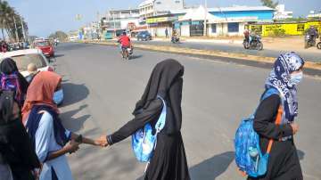 Students wearing hijab who were denied entry, outside IDSG Government College in Chikmagalur.