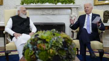 PM Narendra Modi (L) and US President Joe Biden (R).