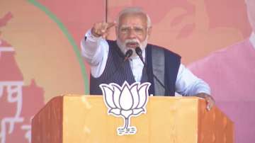 PM Narendra Modi addresses a poll rally in Punjab's Pathankot on Wednesday. 