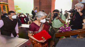 Union Minister of Finance Nirmala Sitharaman with MoS Pankaj Chaudhary arrives at Parliament for the presentation of the Union Budget 2022-23, in New Delhi