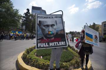 Ukrainians living in Mexico protest against Russia's invasion of Ukraine, in front of the Russian Embassy in Mexico City, Saturday